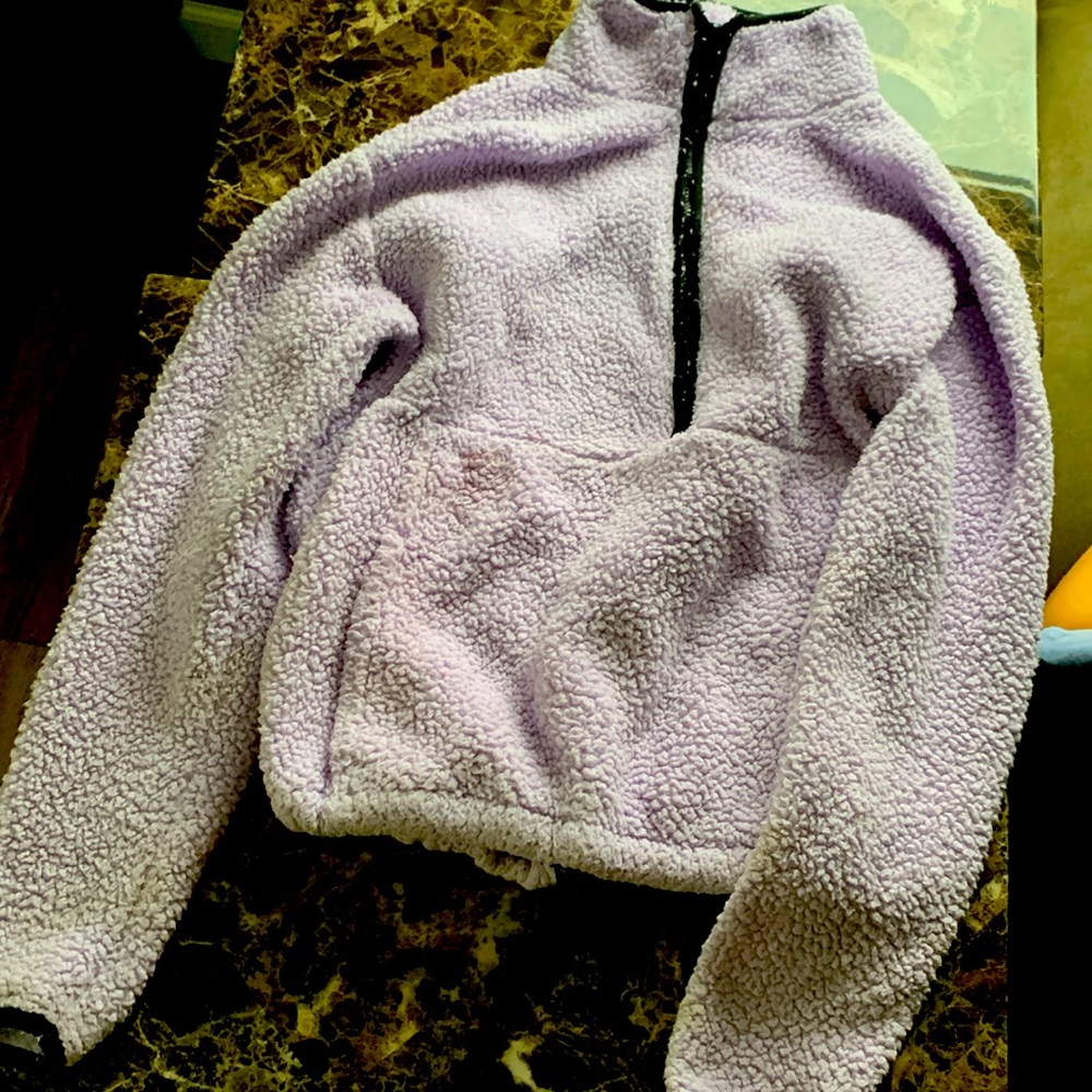 A purple jacket that is fuzzy